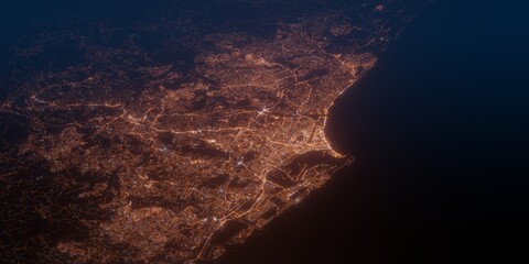 Durban (South Africa) night view with street lights. Aerial shot from space. perspective view heading north, 
