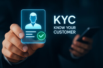 Hand holding kyc identification card with profile icon and phone in a dark setting concept image