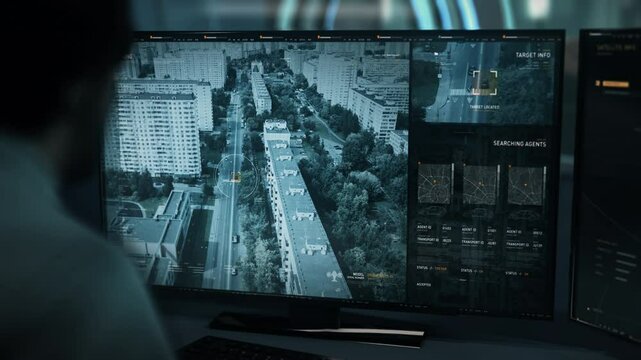 Secret Agent Uses High Tech Tracking Drone To Locate Target During Spy Operation. Secret Tracking Drone Analyzing Position Data Of Car. Secret Tracking Drone Control Interface. Spy Intelligence Agency