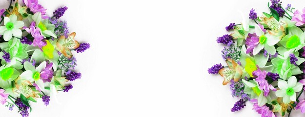 A light spring bouquet with space for text on a white background. Top view.