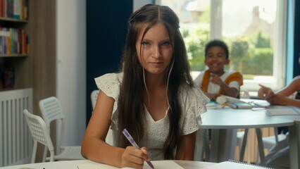 Sad worried Caucasian frustrated girl teen upset schoolgirl pupil student suffer bullying in school...