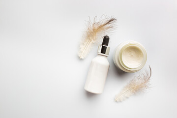 Flat lay composition with skin care products on white background