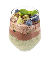 Delicious chocolate pudding with chia seeds, kiwi, mint and blueberries in glass isolated on white