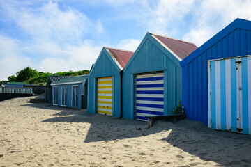 Naklejka premium Colorful Coastal Beach Huts at Abersoch, North Wales