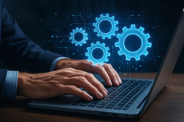 Automation software development engineer working on laptop with digital gears concept image design 100