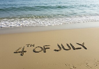 The words 4th of july written in the sand on a beach