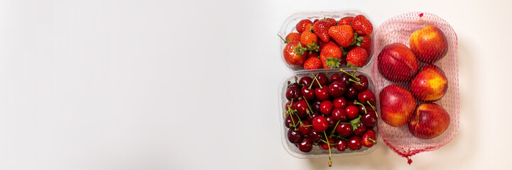 Harvest bounty brims with luscious strawberries, cherries, and peaches, evoking summer solstice feasts and National Cherry Festival delights