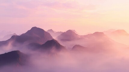 Obraz premium Misty Mountain Range Under Pastel Sunrise Pink and Purple Hues with Cloud Inversion Layers