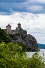 Perched high above the swirling waters, this ancient stone fortress whispers tales of solstice...
