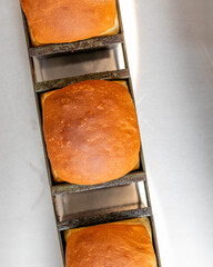Golden loaves cradle warm nostalgia, evoking Bread Day festivities and ancestral baking rituals in...