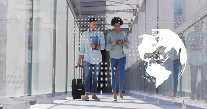 Business team walking skybridge woman raising tablet collaborating on data, globe overlay shifting