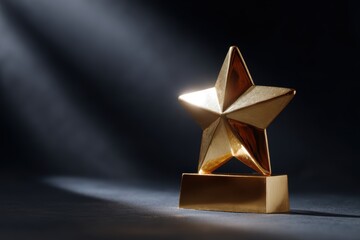 Shining gold star award on black background with dramatic lighting