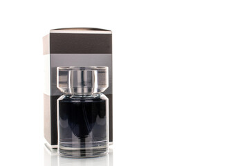 One perfume bottle and paper packaging isolated on white background, close-up.