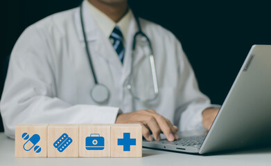Health insurance concept, Doctor stacking wooden cubes with medical icons for healthcare and medical. health and access to welfare health.