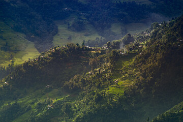 Sun rays falling on Himalayan mountain range, scenic beauty of layers of mountains, Okhrey, sikkim,...
