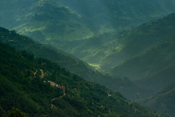 Sun rays falling on Himalayan mountain range, scenic beauty of layers of mountains, Okhrey, sikkim, India. Okhrey village a remote place in Sikkim where mountain range view is enjoyed by tourists.