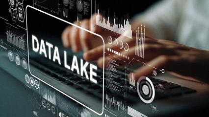 Hands Typing on Keyboard with Data Lake Concept Displayed on Screen Representing Big Data...