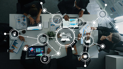 Group of Business Professionals Engaged in Data Analysis and Project Planning with Digital SEO...