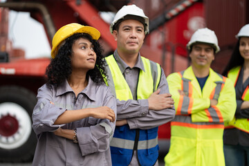 Asia woman with Group of engineer or workers at container site	