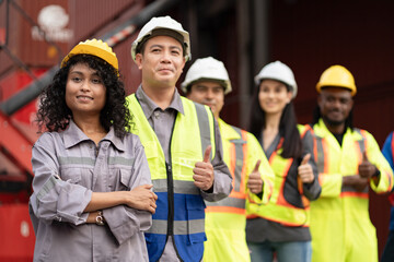 Asia woman with Group of engineer or workers at container site	