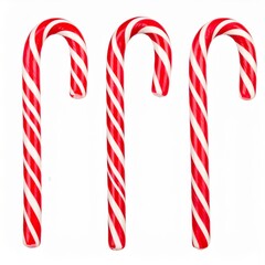 Three Red and White Striped Candy Canes on a White Background in Studio Lighting