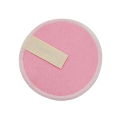   A close-up, isolated view of a single pink reusable cotton facial cleansing pad on a clean white...