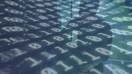 Hooded man standing in server room receiving cascading binary overlay enveloping silhouette