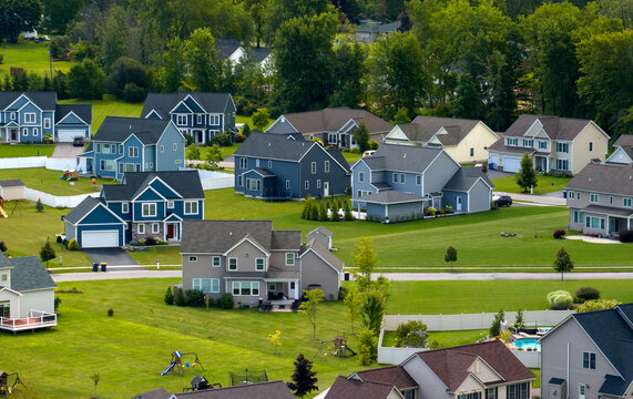 Housing market in the USA. Residential homes in suburban sprawl development in Rochester, New York. Low-density two story private houses in rural suburbs