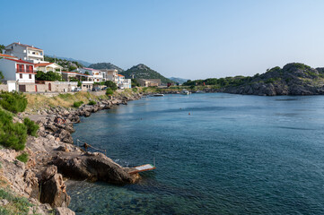 Fototapeta premium A bay on the edge of the small fishing village of Sveti Juraj, with a small island, on the Adriatic coast, Croatia