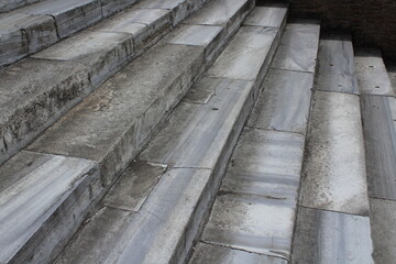 Marble stairs textured background wallpaper. Perspective of the staircase and railing on concrete...