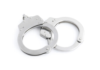 Handcuffs on white background, above view. Police equipment