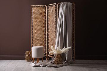 Photo zone with stylish folding screen in studio