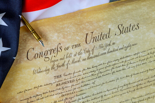 10 June 2025 Washington DC This historical parchment document shows resolutions from early U.S. alongside American flag fabric