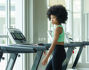 Child girl black smile like training active exercise sport run jogging on treadmill machine test...