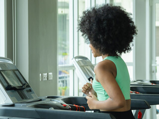 Child girl black smile like training active exercise sport run jogging on treadmill machine test...