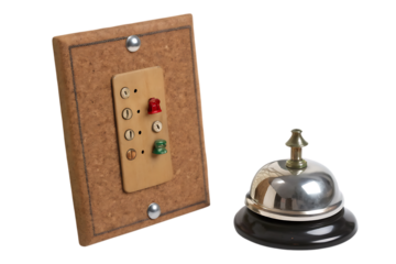 Old fashioned switchboard with a silver service bell