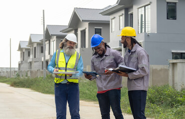 Professional architect and foreman wear head hat talk meeting safety work team check inspection...