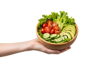 Healthy salad in wooden bowl held by hand, fresh greens and colorful veggies