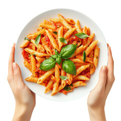 Delicious penne pasta in tomato sauce garnished with basil served on a white plate held by hands