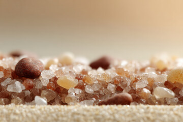 closeup view of sand and pebbles on soft clean background featuring ultrabright accent that enhances textures