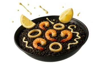 Authentic black paella with seafood, lemon, and aioli, isolated on transparent background