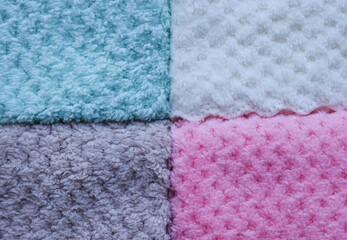 Background of colorful towels. Several soft terry towels.