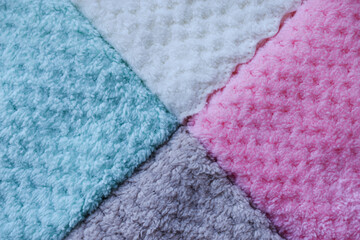 Background of colorful towels. Several soft terry towels.