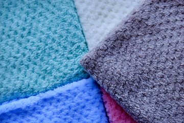 Multi-colored pile towels. A soft towel.
