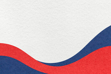 Textured paper background with red blue wavy ribbons and white copy space for 4th of July and Independence Day