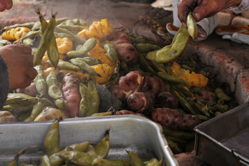 photography of traditional Peruvian food called Pachamanca. Food concept.
