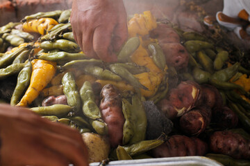 photography of traditional Peruvian food called Pachamanca. Food concept.