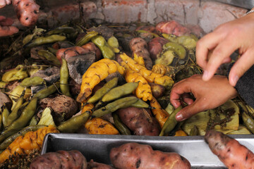 photography of traditional Peruvian food called Pachamanca. Food concept.