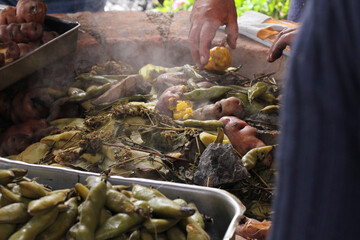 photography of traditional Peruvian food called Pachamanca. Food concept.