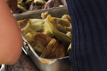 photography of traditional Peruvian food called Pachamanca. Food concept.